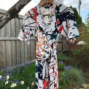 BCBG paint splatter wrap dress. NWOT Size M